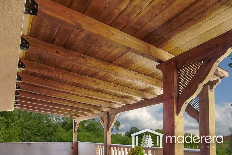 Una pérgola de madera con la palabra madera en la parte inferior.