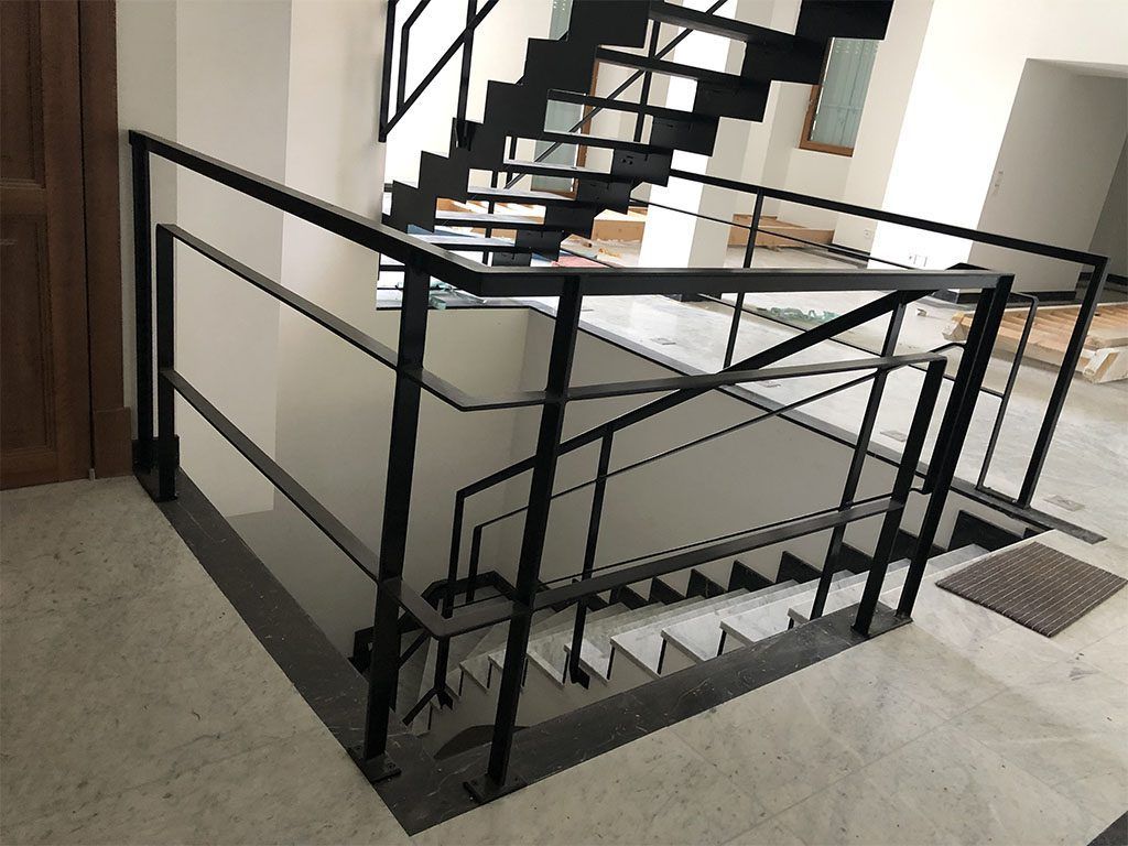 Double escalier avec garde corps