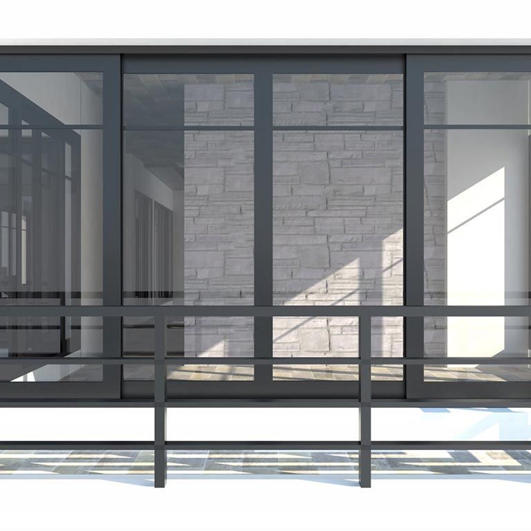Façade moderne en verre avec balustrades noires et lumière du soleil projetant des ombres sur les murs en pierre