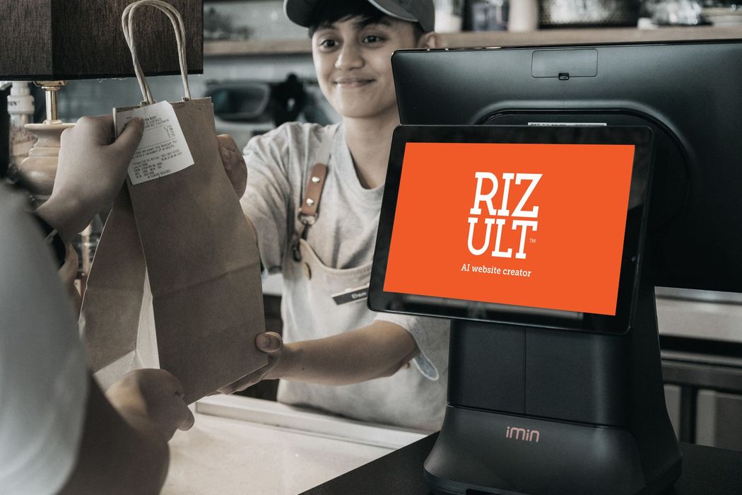 A woman is holding a bag in front of a computer screen that says riz ult