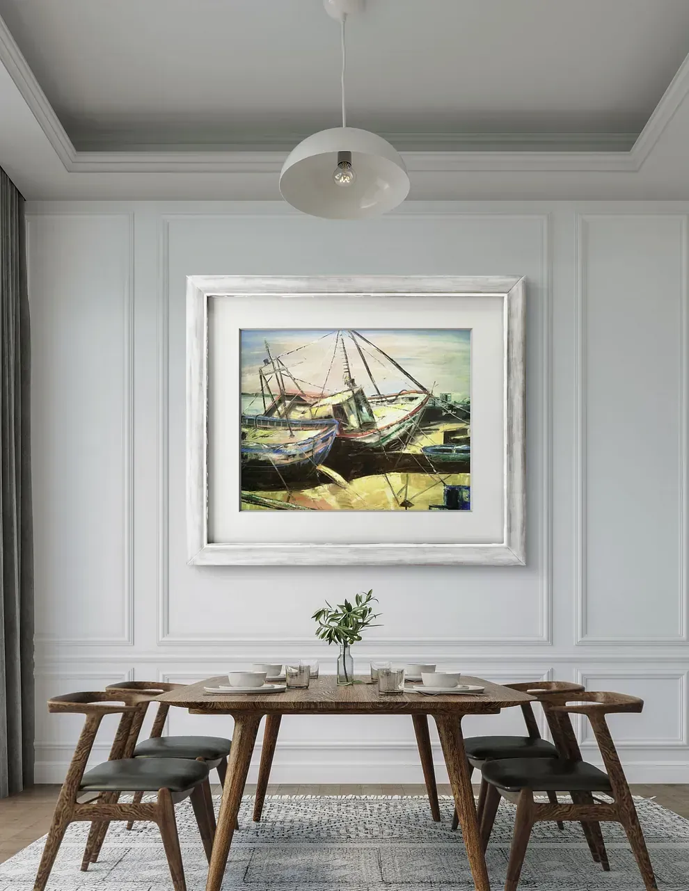 Un comedor con una mesa y sillas y un cuadro en la pared.