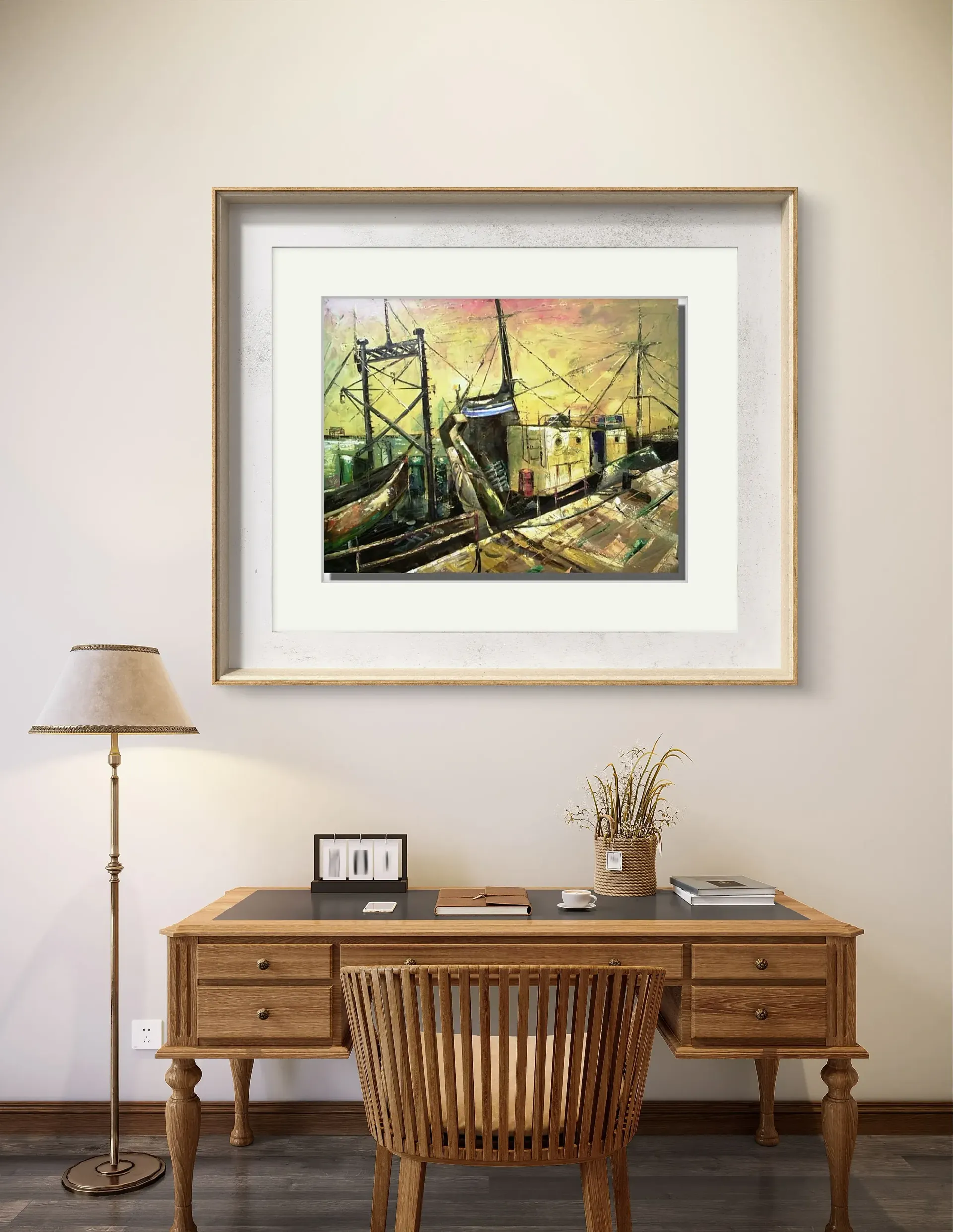 Un cuadro está colgado en una pared encima de un escritorio y una silla.