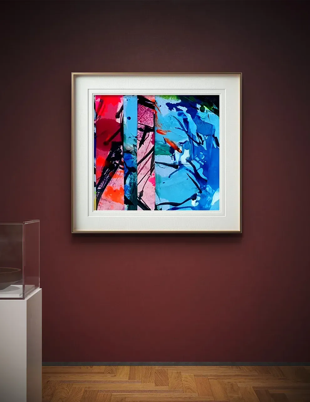 Un cuadro enmarcado está colgado en una pared roja.