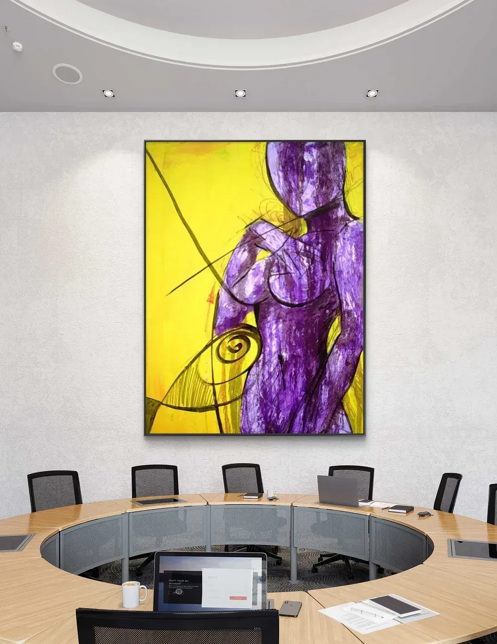 Una sala de conferencias con un gran cuadro de una mujer en la pared.