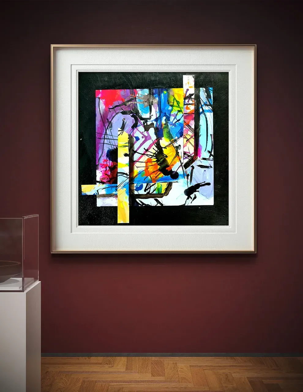 Un cuadro enmarcado está colgado en una pared roja.