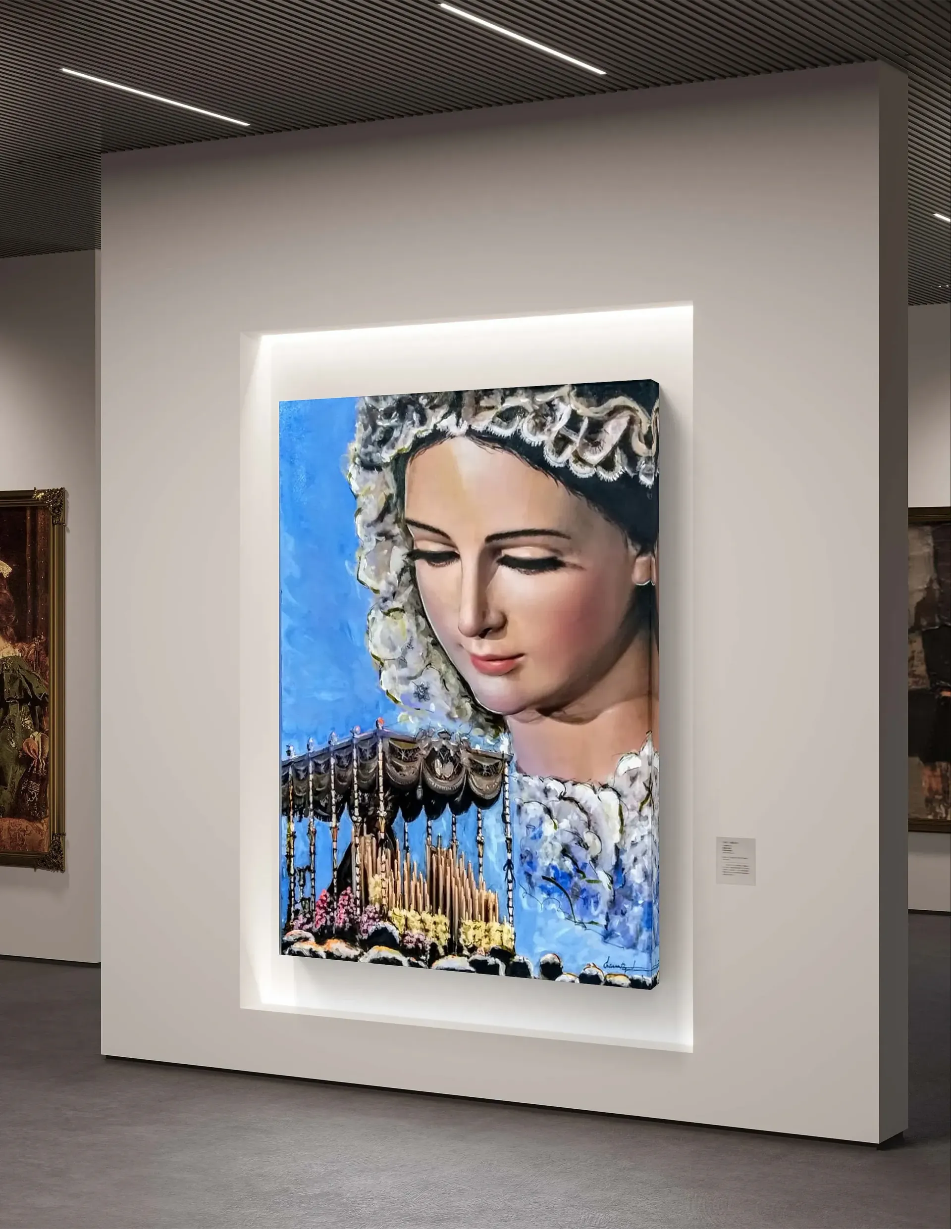 Un cuadro del rostro de una mujer está colgado en una pared.