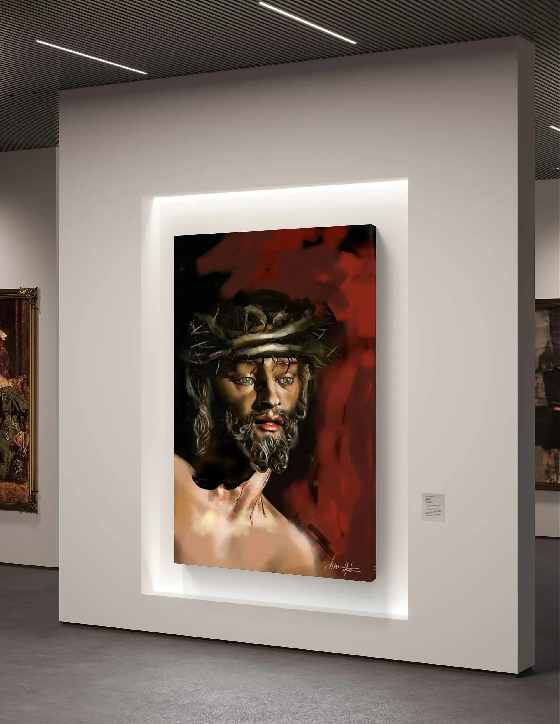 Un cuadro de Jesús con una corona de espinas cuelga en una pared blanca.