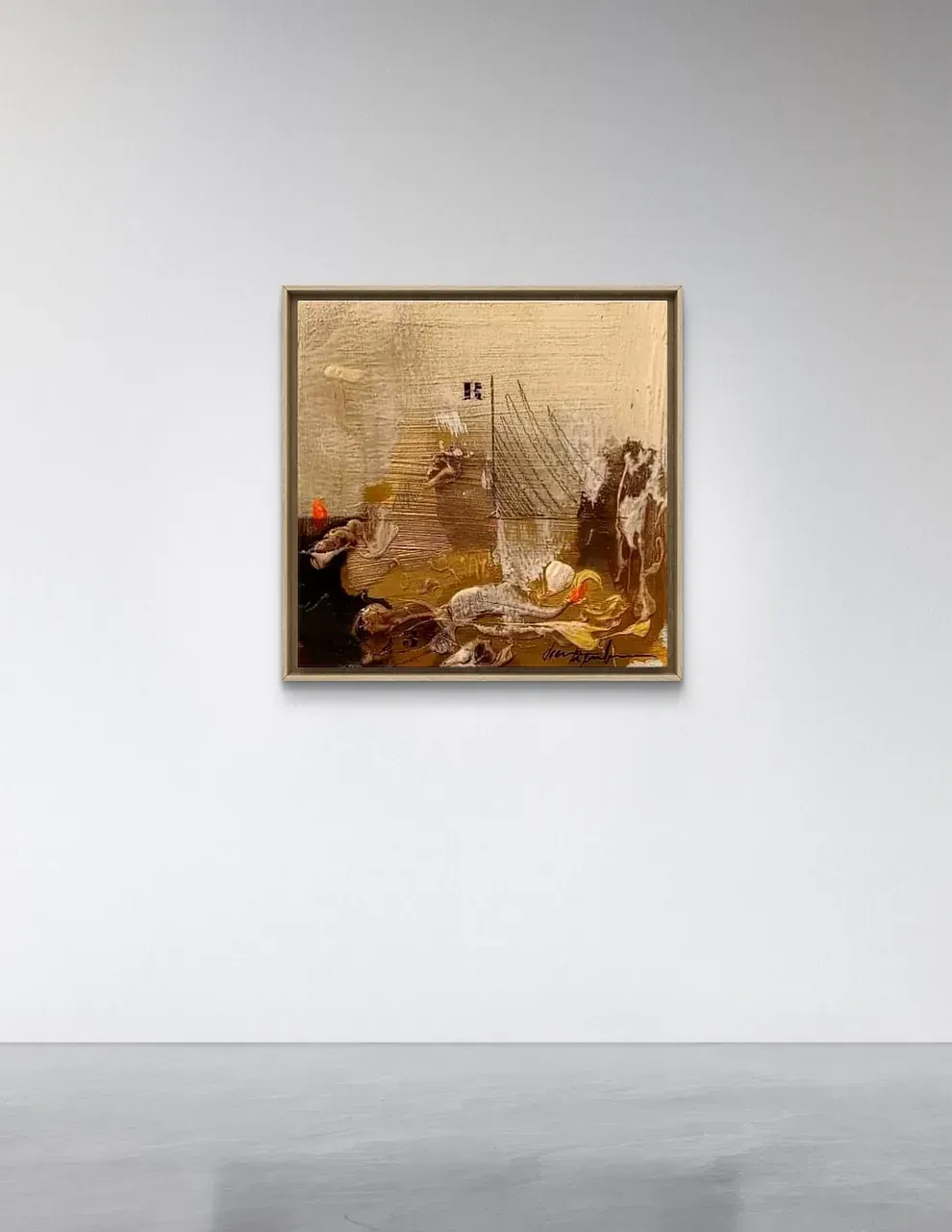 Un cuadro está colgado en una pared blanca de una habitación.