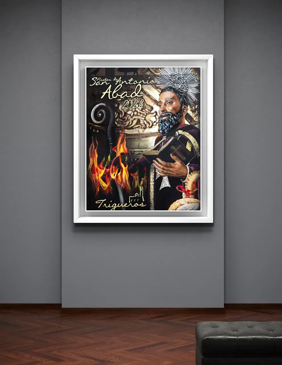 Un cuadro enmarcado de un hombre con barba está colgado en una pared.