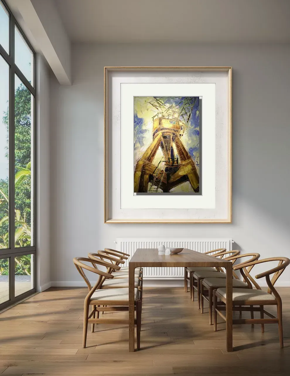 Un comedor con una mesa y sillas y un cuadro en la pared.