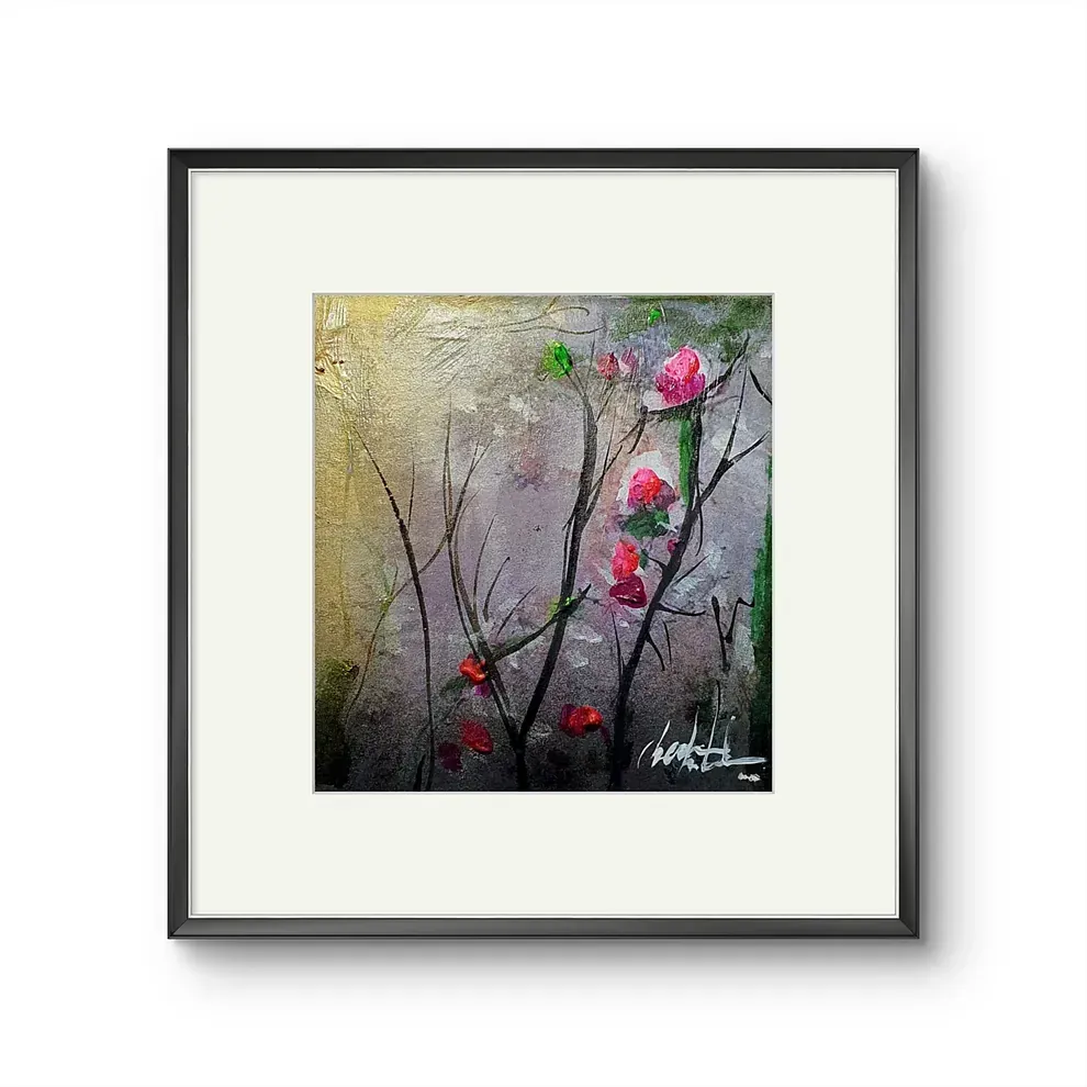 Un cuadro enmarcado de flores rosas en la rama de un árbol.