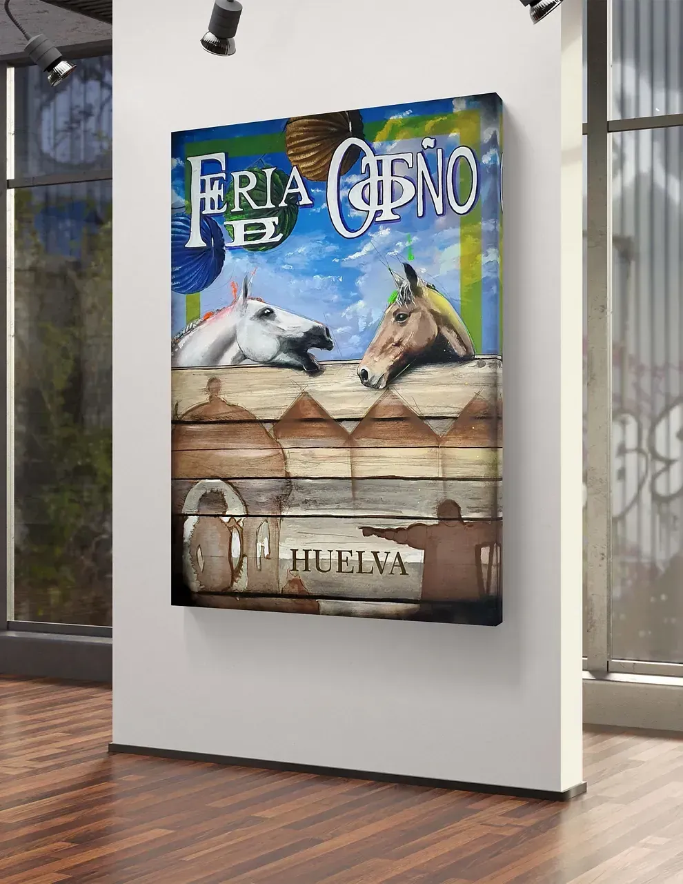 Un cuadro de dos caballos está colgado en una pared.
