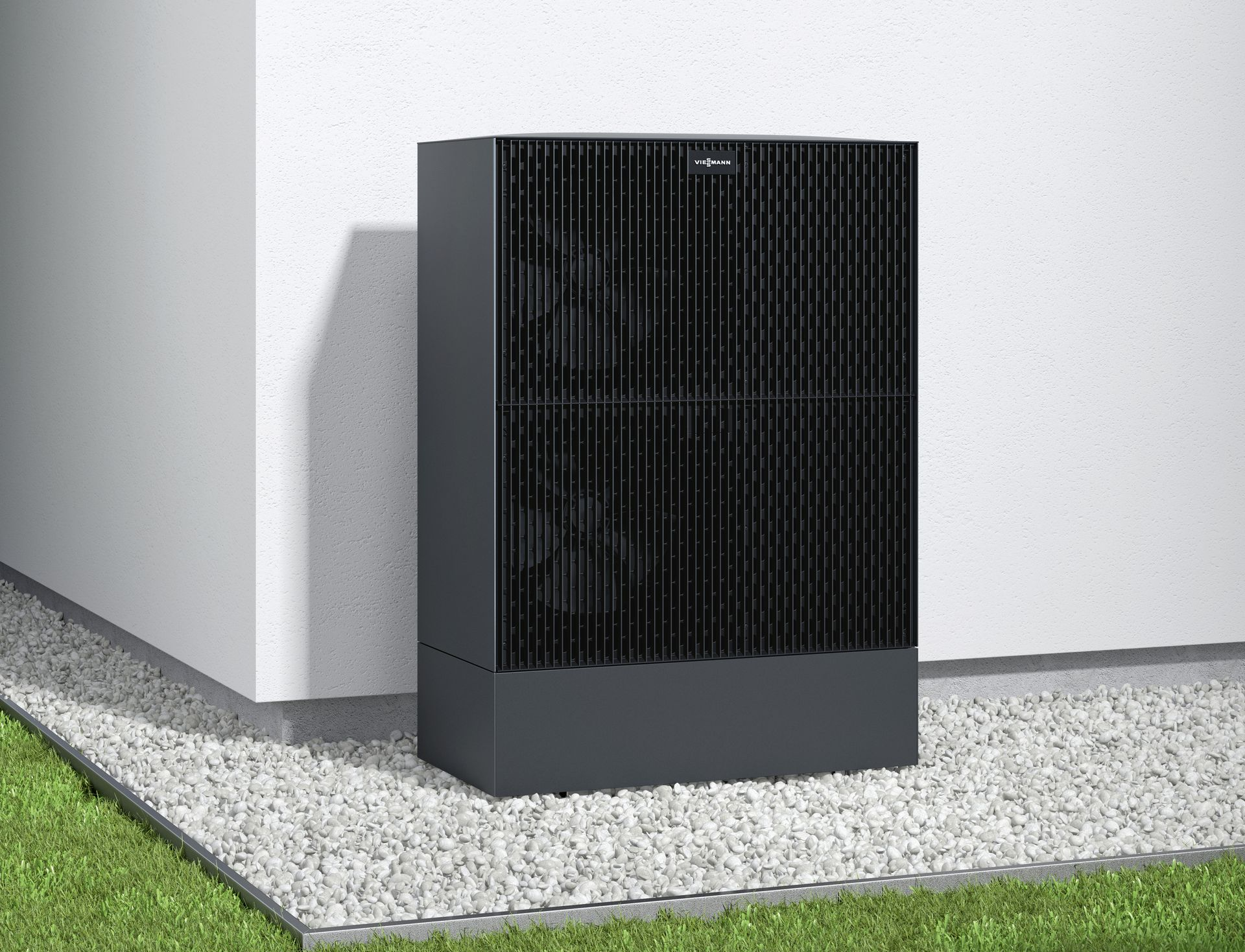 Auf einer reflektierenden Oberfläche verlegte Rohre einer Fussbodenheizungsanlage, befestigt mit schwarzen Klemmen.