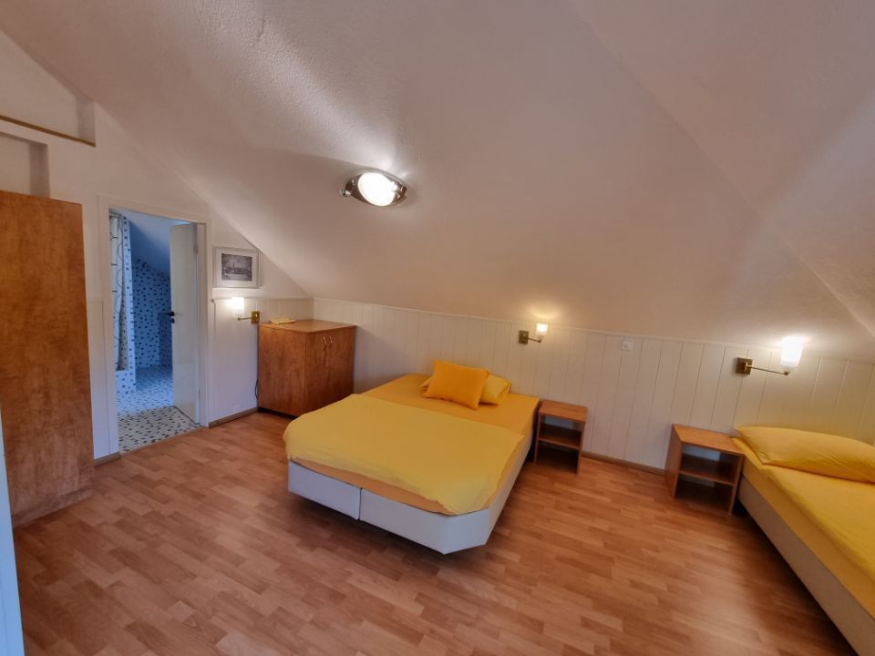 Hotelzimmer mit 3 Betten