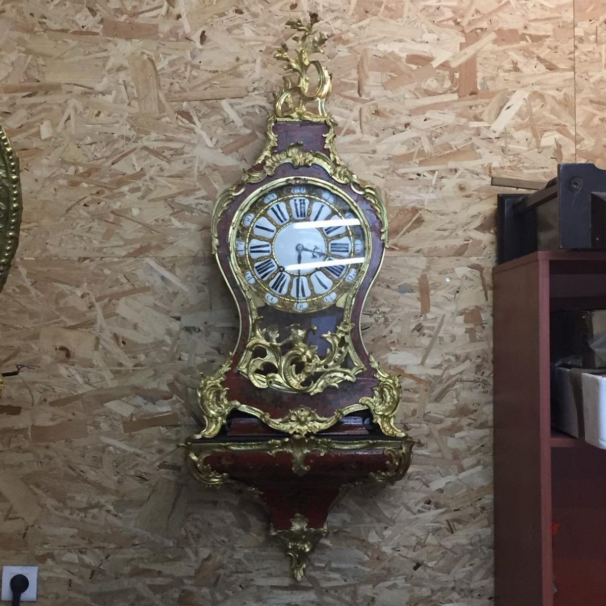 Horloge ancienne à dorures restaurée