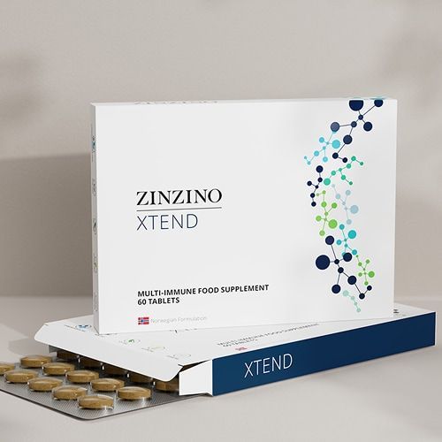 Caja de suplemento nutricional Zinzino Xtend con cápsulas doradas sobre una superficie blanca.