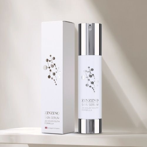 Caja y botella de Zinzino Collagen Booster sobre fondo claro, con diseño de molécula dorada.