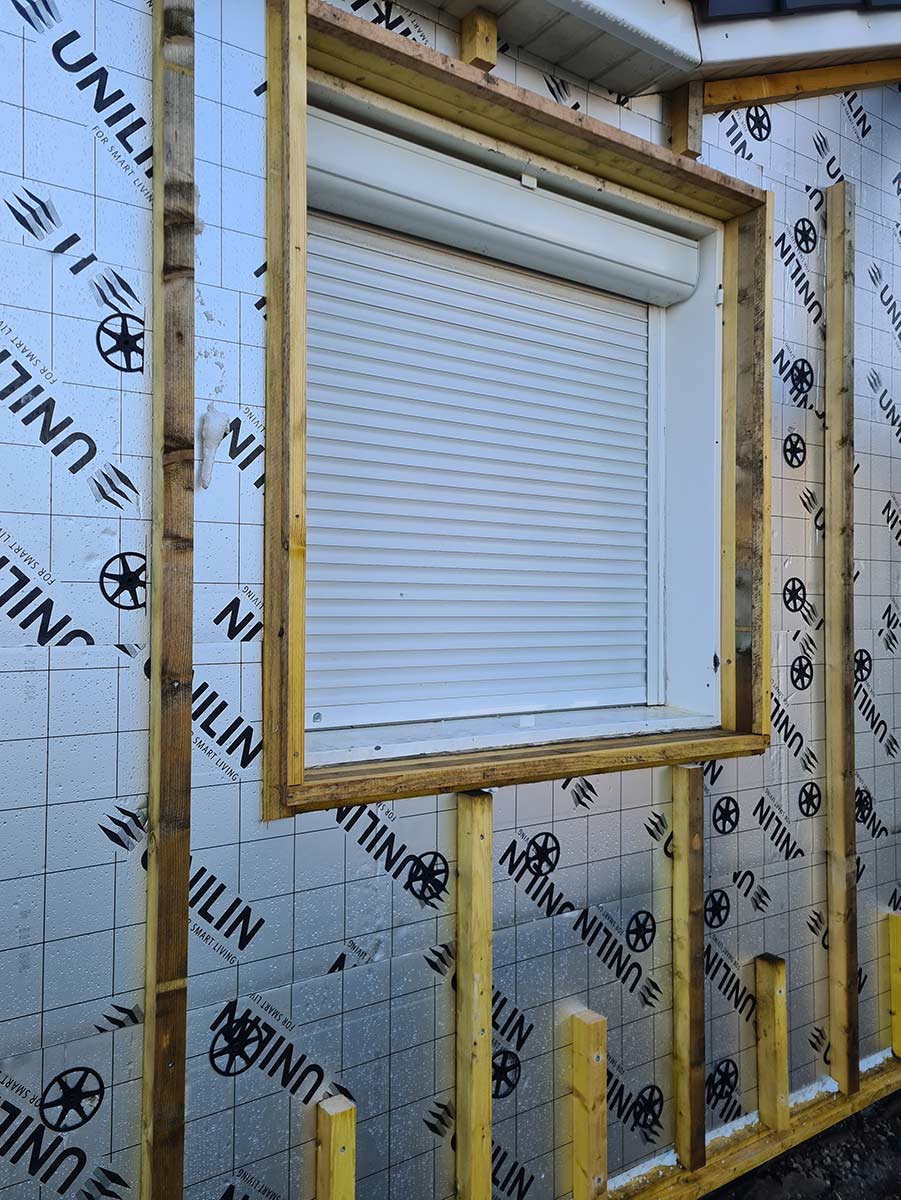 Photo de réalisation Isolation extérieur grande fenêtre