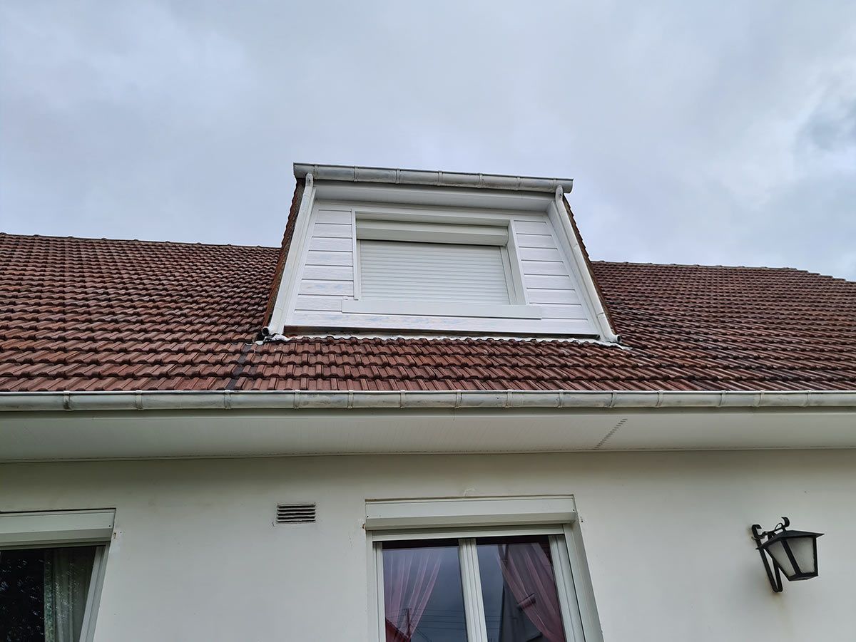 Photo de réalisation store fenetre de toit