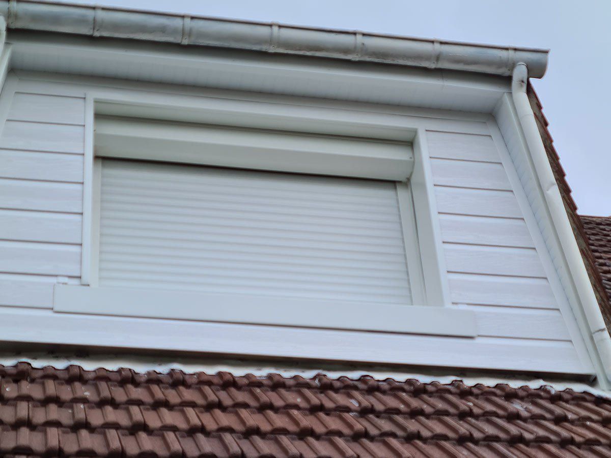 Photo de réalisation store fenetre de toit zoomé