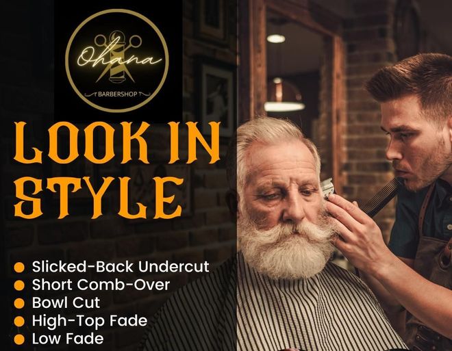 Un hombre con barba se deja cortar el pelo por un barbero.