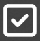 Marca de verificación blanca dentro de un cuadrado con borde blanco sobre un fondo gris, que indica selección o confirmación.
