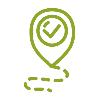 Un alfiler verde con una marca de verificación en su interior.