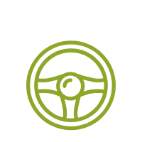 Un icono de volante verde sobre un fondo blanco.