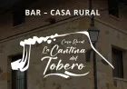 Un cartel que dice bar casa rural la cantina del tobero