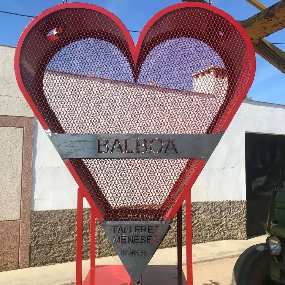 Un gran corazón rojo con la palabra