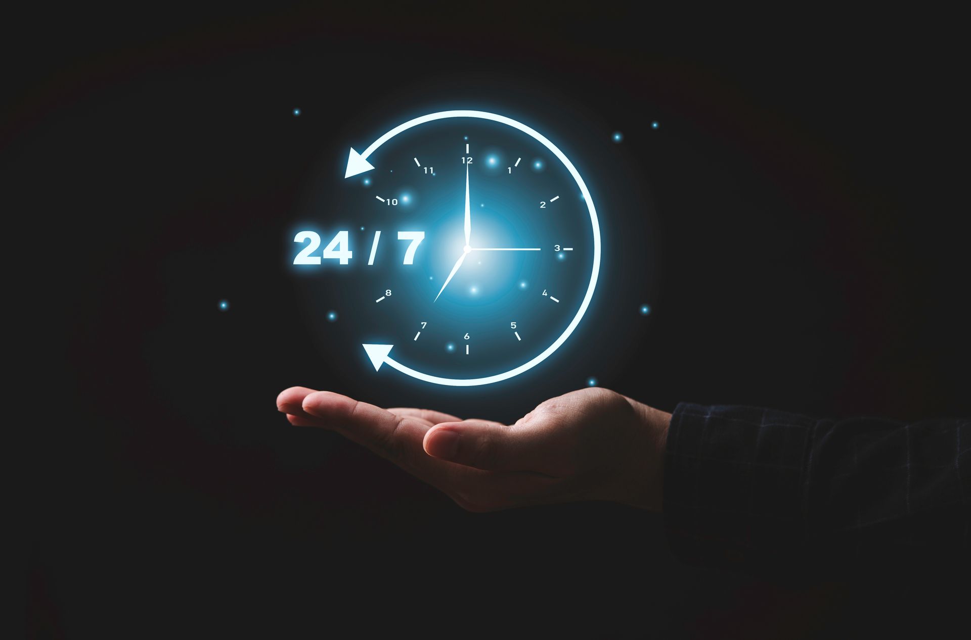 Horloge numérique lumineuse 24h/24 et 7j/7 au-dessus d'une aiguille tendue sur fond sombre.