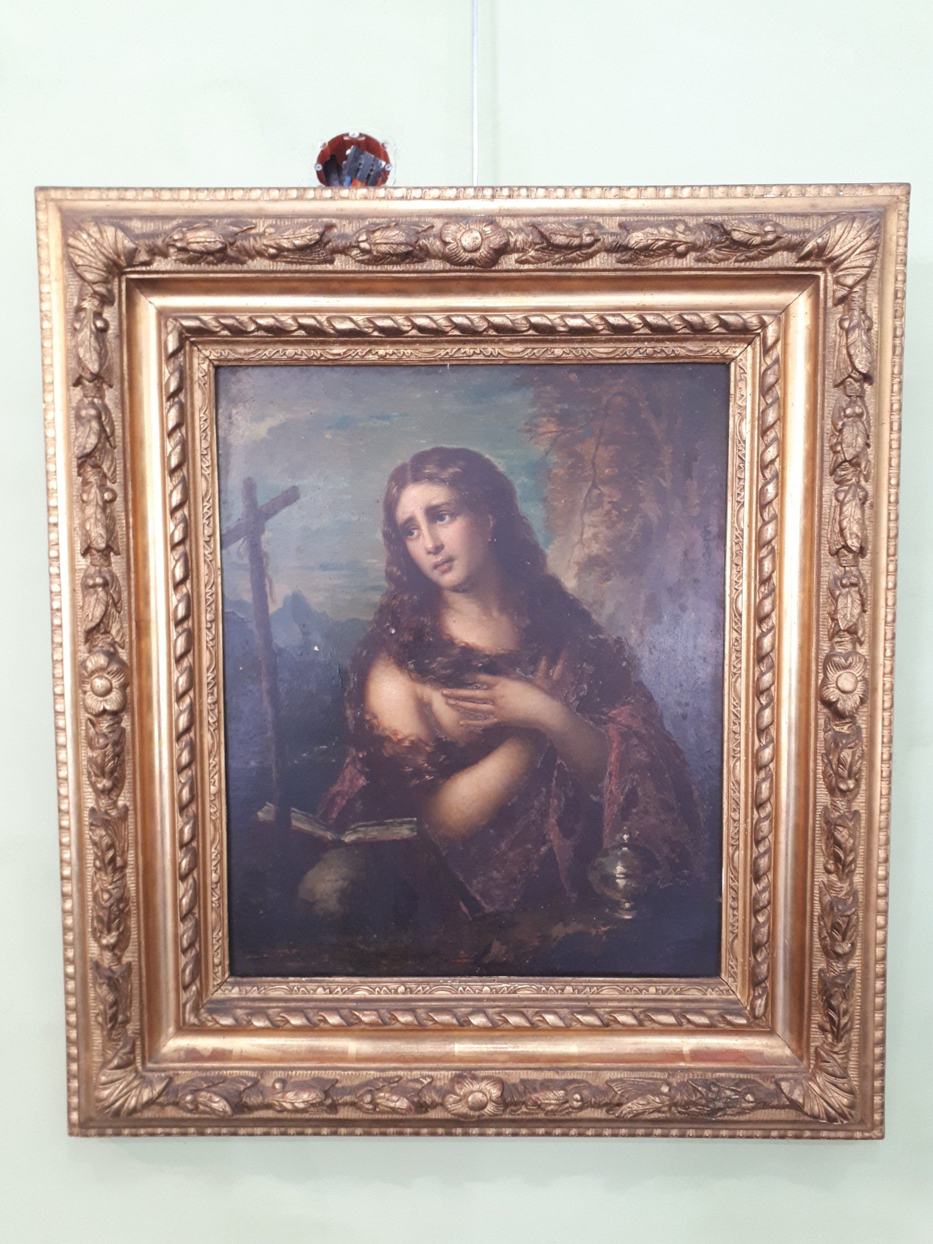 Tableau d'une femme avec un cadre