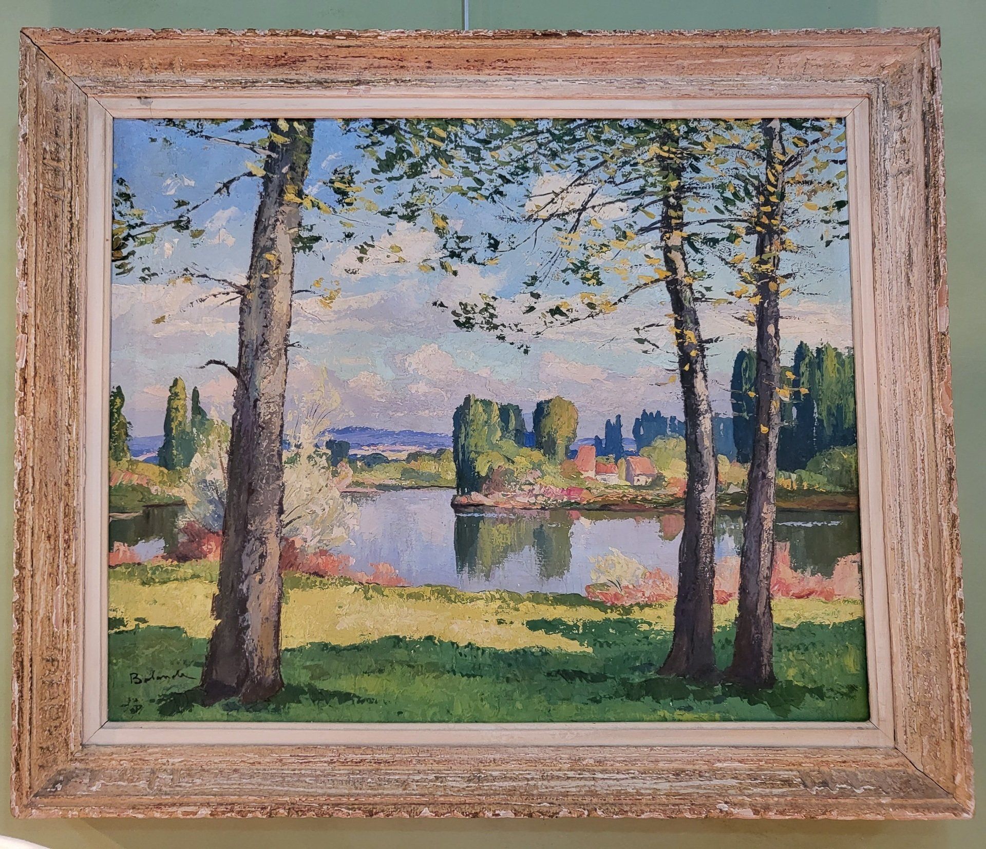 Peinture d'un paysage avec un cadre en bois