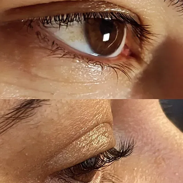 Un primer plano del ojo de una mujer con pestañas largas.