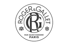 Logo Roger & Gallet : emblème circulaire avec « R » et « G » stylisés à l'intérieur, entouré de texte et de motifs floraux.