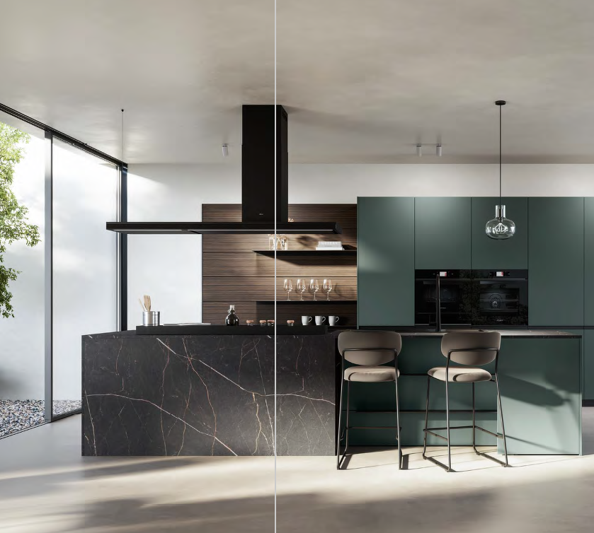 Una cocina con gabinetes blancos, un fregadero y una estufa.