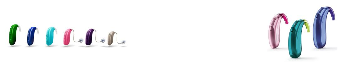 Appareils auditifs de différentes couleurs présentés sur fond blanc.