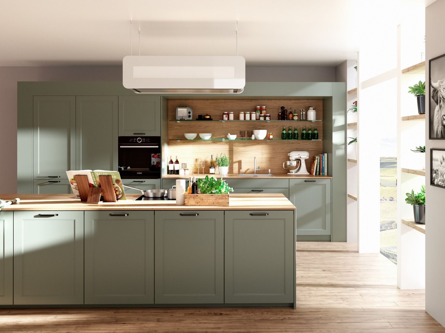 Eine moderne Küche mit salbeigrünen Schränken, einer Kochinsel, Holzregalen und einer weißen Dunstabzugshaube.