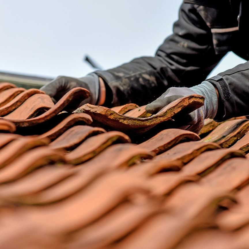 Remplacement d'une tuile