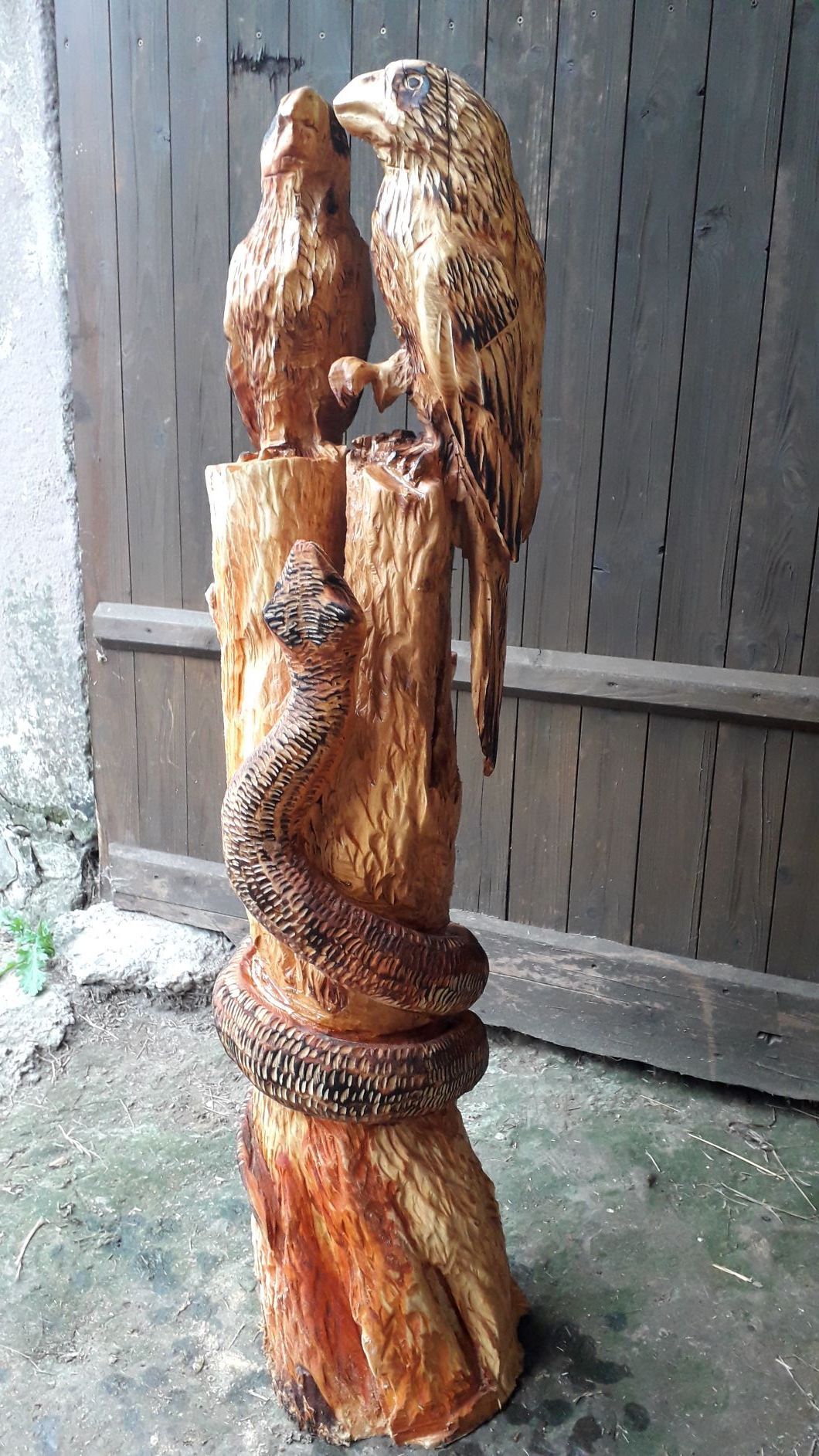 Holzskulptur Schlange