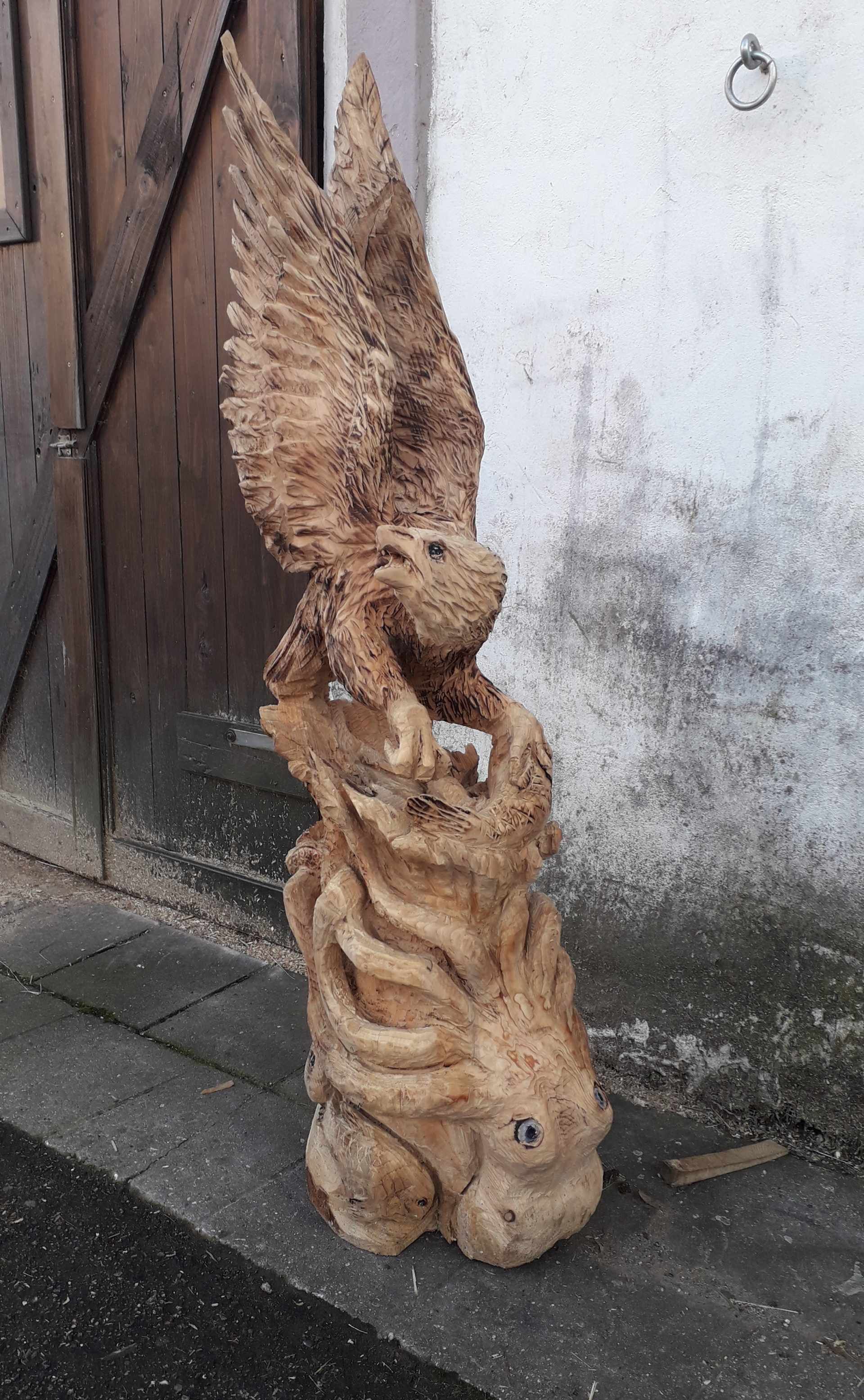 Holzskulptur Adler und Kraken