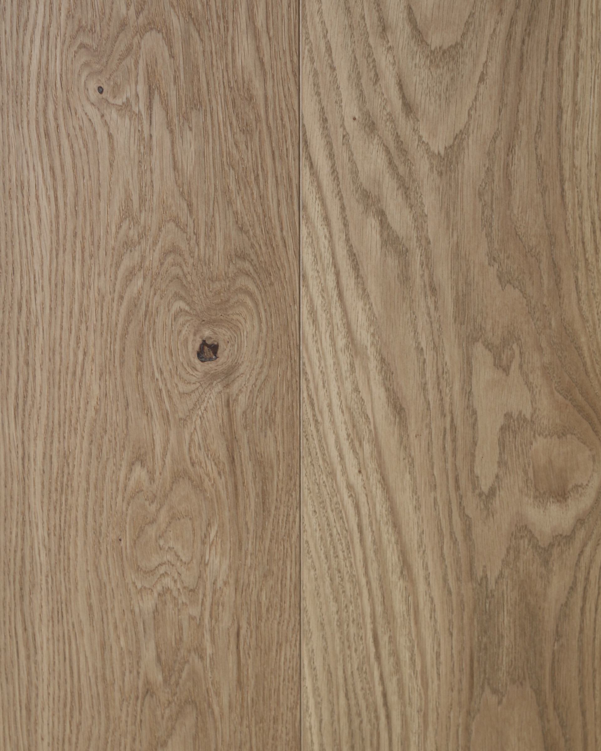 Surface en bois clair au grain visible, occupant tout le cadre