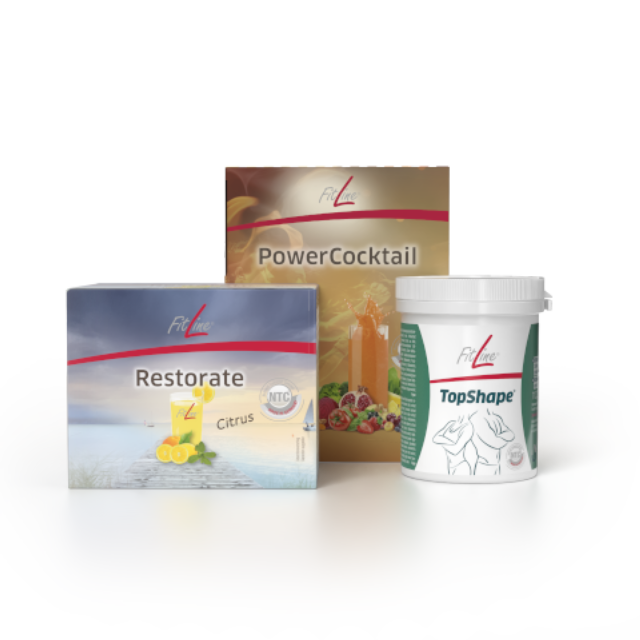 Ein Glas Limonade mit Zitronenscheiben und Minze.