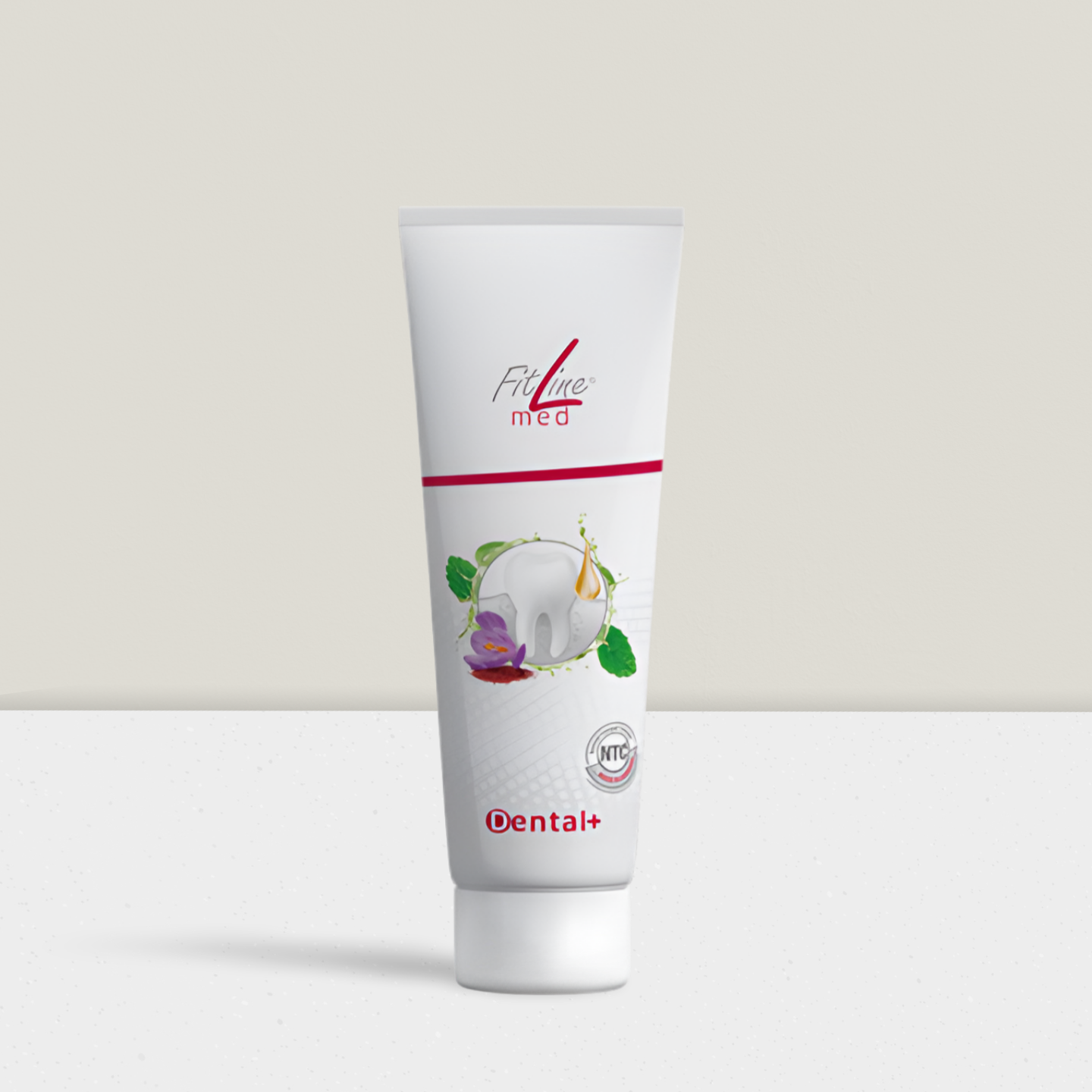 Tube mit weißer Zahnpasta und einer Abbildung von Zahn, Blume und Blättern.