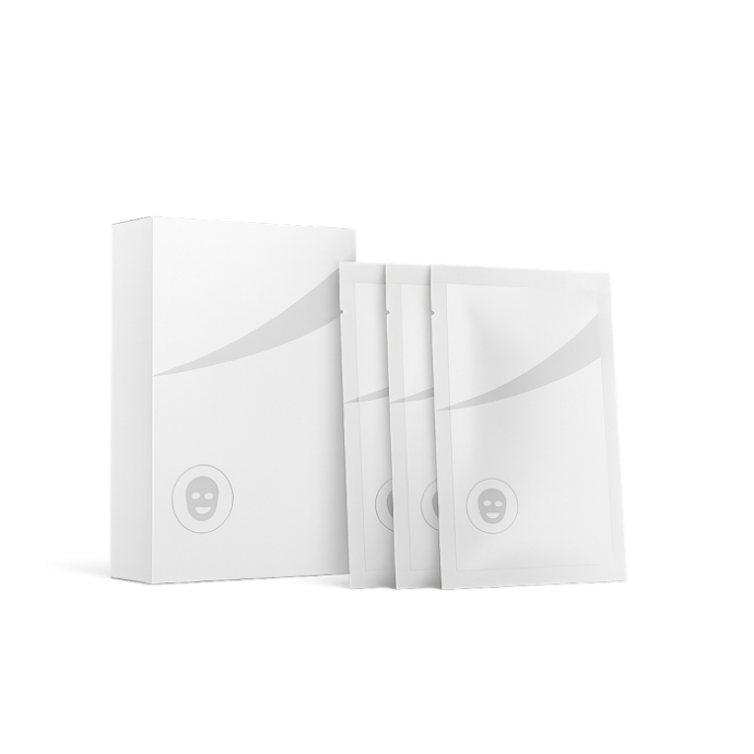 Weiße Schachtel und Sachets mit einem Hautpflegeprodukt.