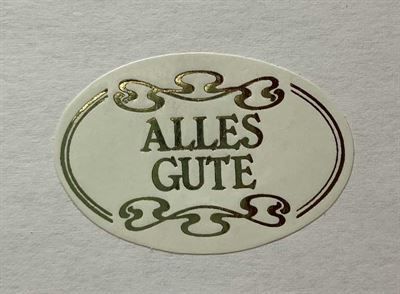 Ein Aufkleber mit der Aufschrift „Alles Gute“ darauf