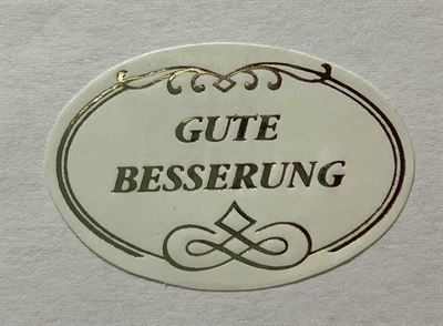 A sticker that says gute besserung on it