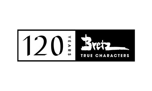 120 Jahre Bretz True Characters Logo, schwarz-weißes Banner mit goldener Schrift.