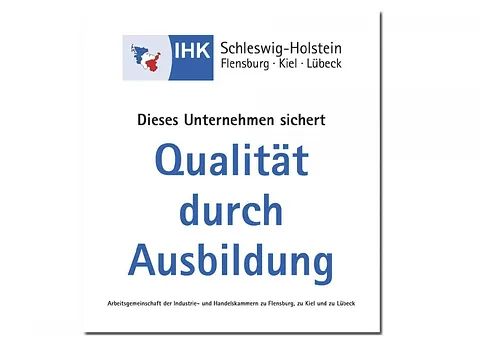 A sign that says quality durch ausbildung on it