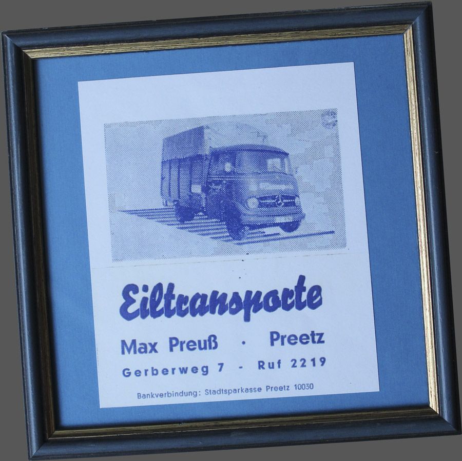 Ein Bild von einem LKW in einem Rahmen mit der Aufschrift „eiltransporte“
